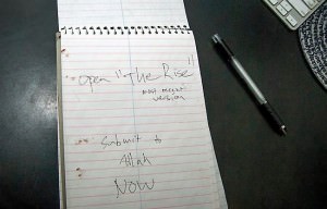 Police released this photo of a spiral notebook found in an office in the Crowley home, open to a page with dried blood on it and the handwritten words, "Submit to Allah NOW." Photo courtesy of the Apple Valley Police Department.