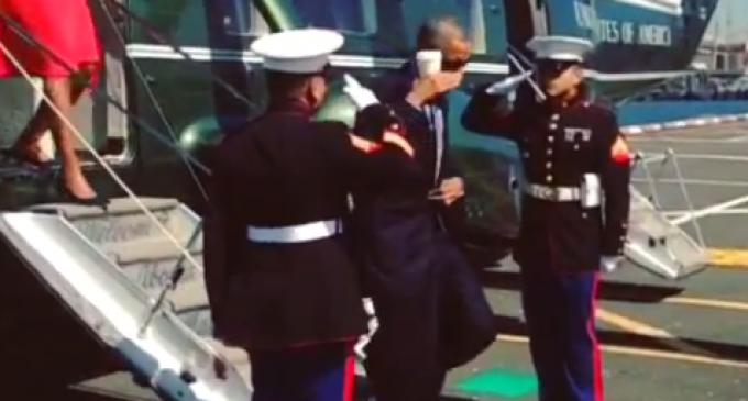 Obama Salutes Marines With Coffee Cup