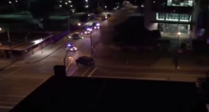 Crazed Gunman In Armored Van Opens Fire on Dallas Police Station