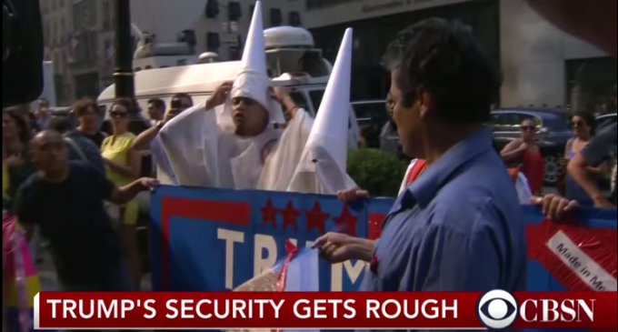 Trump Security Manhandles Protesters Dressed Like KKK