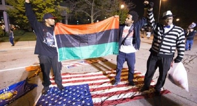 Black Lives Matter Protesters Burn American Flag, Hoist Black Resistance Flag