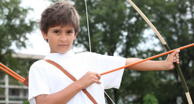 Boy Suspended for IMAGINARY Bow and Arrow