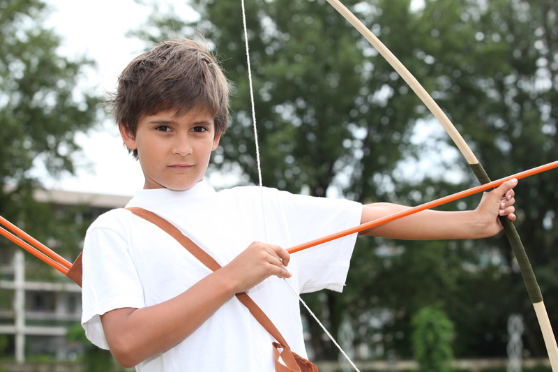 Boy Suspended for IMAGINARY Bow and Arrow