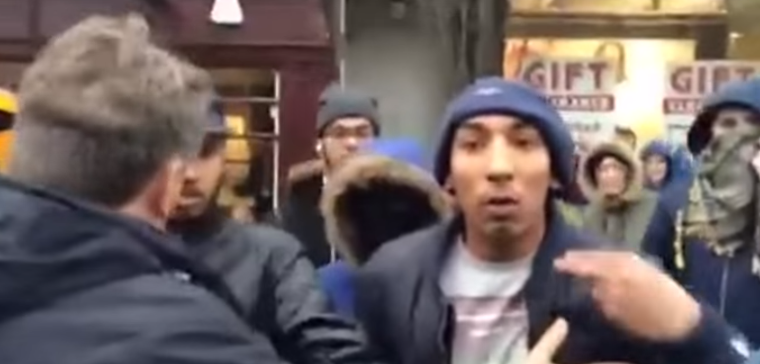 Aggressive Migrant Attacks Activist