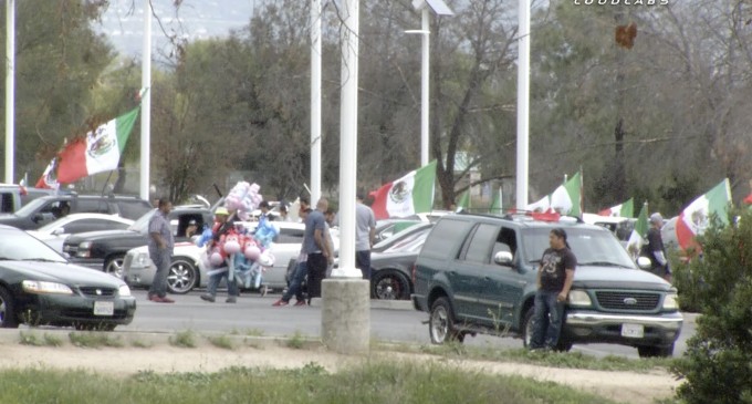 Protesters Raise Mexican Flags in Celebration of Stopping Trump Rally