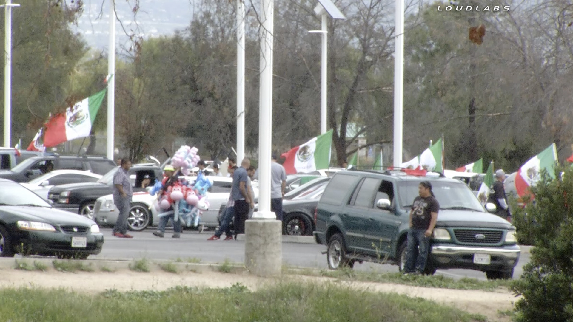 Protesters Raise Mexican Flags in Celebration of Stopping Trump Rally