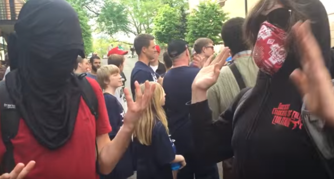 “Tranny” Protestor Spits In Face Of Trump Supporter