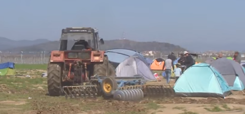 Greek Farmer Fed Up with Refugees Living on his Propery Fires Up his Tractor