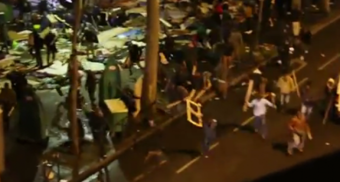 Hundreds of Migrants with Metal Poles Battle Vigilantes in Ferocious Melee