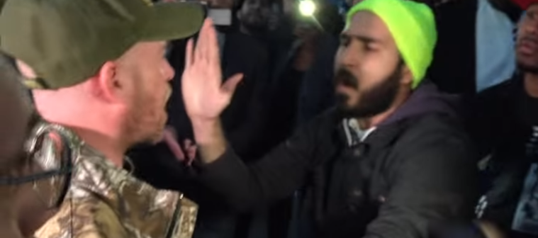 Black Activists Stomp and Spit on the Stars and Stripes at Trump Rally, “#Fu@K Yo Flag”