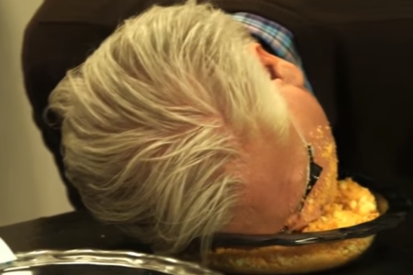 Glenn Beck Mocks Trump by Planting his Face in Crushed Cheetos