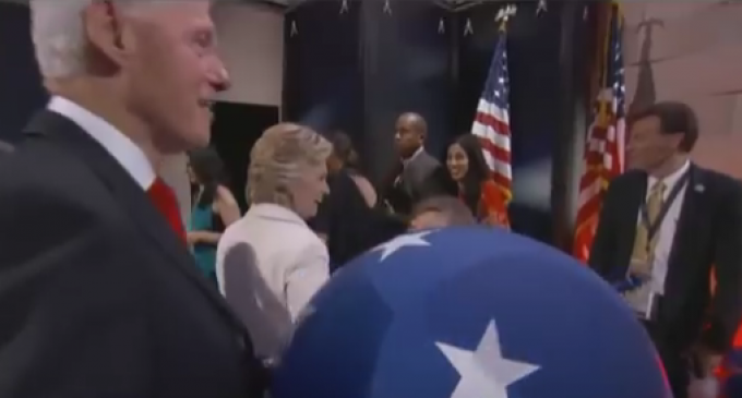 Hillary Celebrates her Nomination over Fallen American Flag