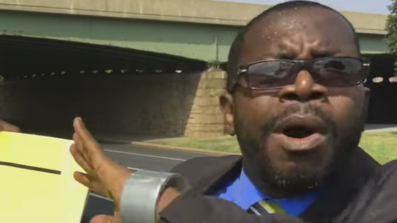 Haitians Protest Outside DNC, Calls for Hillary to be Thrown in Jail