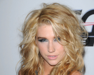 Kesha: “We can control who we give ‘f—ing weapons to”