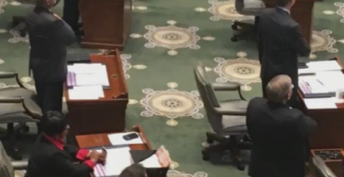 State Senator Sits for Pledge of Alliegance to Support Colin Kapernick