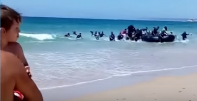 Video: Beachgoers Shocked as Migrants Storm Spanish Beach