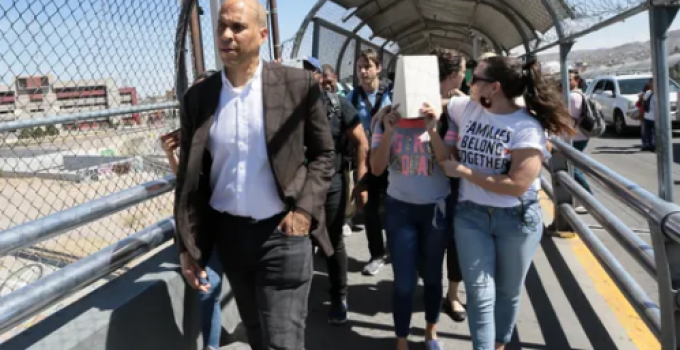 Cory Booker Accused of ‘Breaking the Law’ After Escorting Deported Migrants Back Across the Border