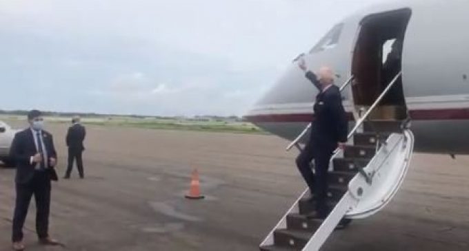 Joe Biden Waves at Empty Field as He Departs Plane in Tampa