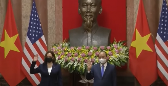 Kamala Harris Poses in Front of Communist Ho Chi Minh Bust