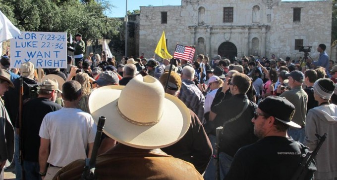 Armed gun rights activists rally at the Alamo